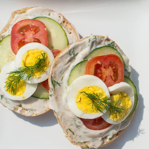 Bagel with Dill Cream Cheese, Tomato, Cucumber and Egg